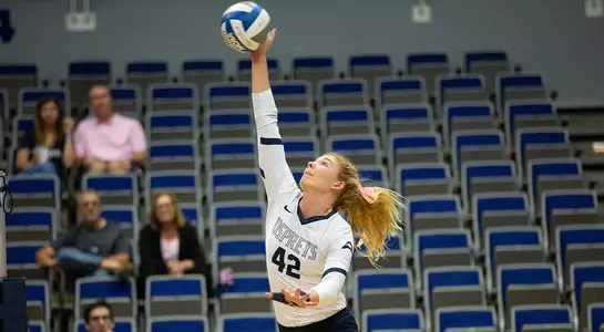 Taryn Griffey reaches out to hit the volleyball.