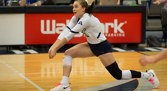 Kaileen Herman gets in position to dig the volleyball.