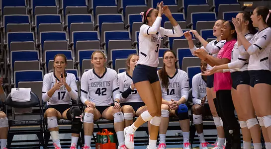 Gabby O'Connell high fives her teammates during the pregame introductions.