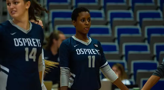 Charyari Ramos peers onto the other side of the court during a volleyball match.