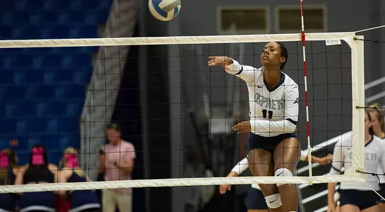 Charyari Ramos follows through after hitting the volleyball.