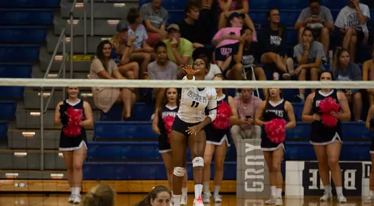 Charyari Ramos prepares to serve the volleyball