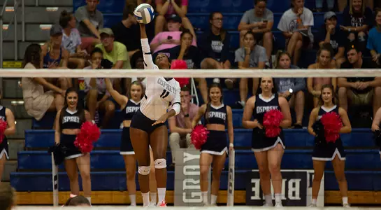 Charyari Ramos connects on a serve of the volleyball