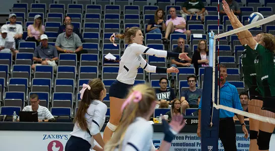 Kirby Smith follows through after hitting a spike at the net