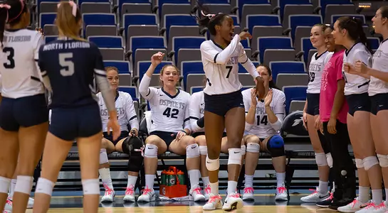 Devyn Wheeler walks off the bench during pregame introductions prior to the volleyball match.