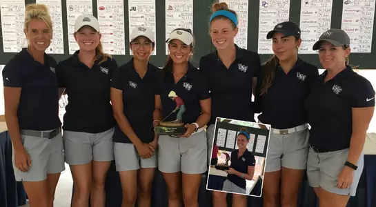 Team photo of North Florida women's golf team getting the championship trophy at the 2018 Pinehurst Challenge
