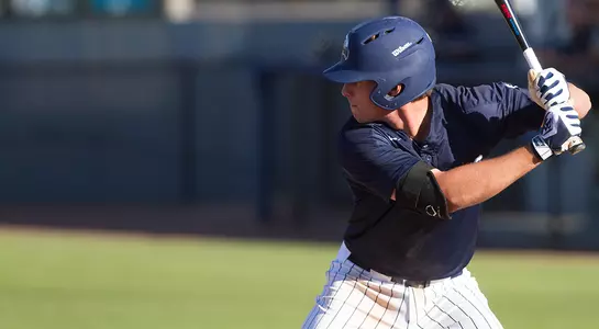 Chris Berry rears back to hit an incoming pitch
