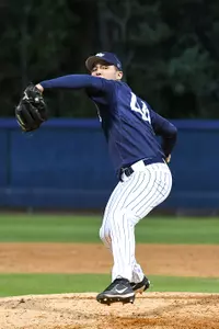 Brad Depperman rears back to throw a pitch