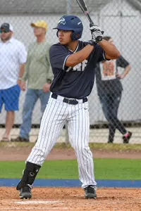 Raff Libunao prepares to take a swing at the ball while at bat