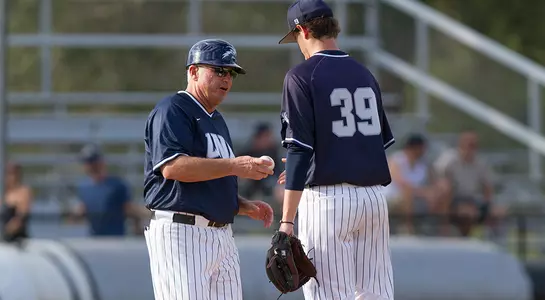 Nick Marchese gets handed the ball from his coach