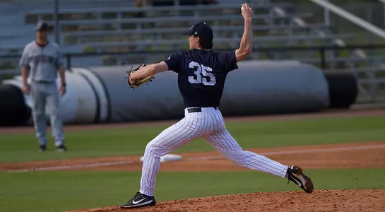 Ethan Michaelis winds up to throw a pitch