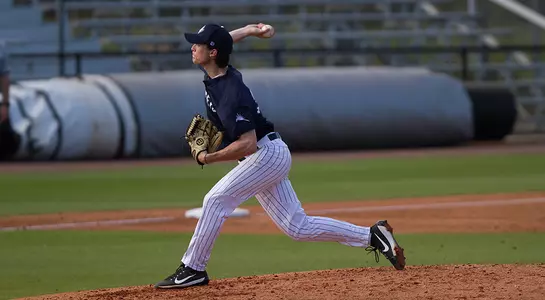 Ethan Michaelis swings his arm as he throws a pitch