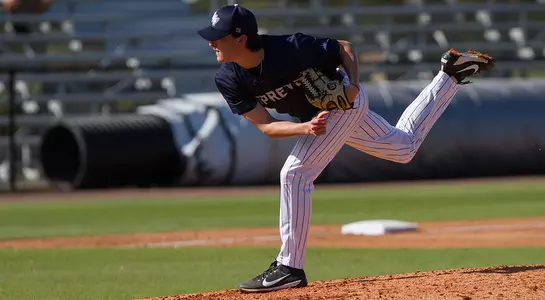 Ethan Michaelis follows through after pitching the ball