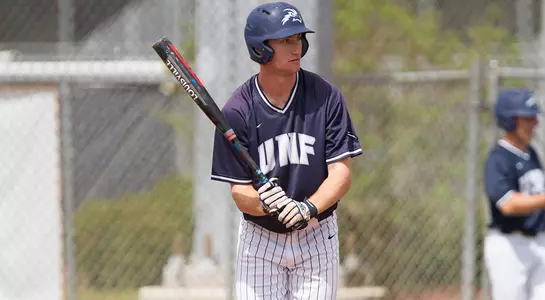 Tanner Murphy holds the bat before going up to home plate