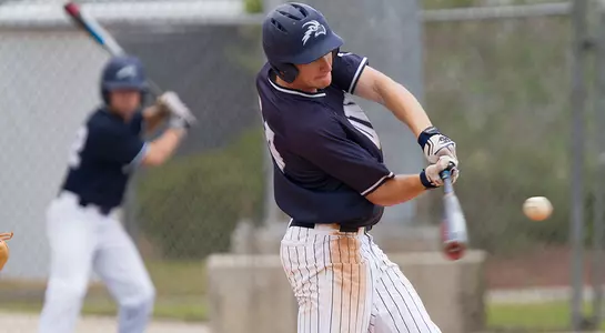 Tanner Murphy swings his bat at the incoming pitch