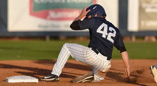 Jay Prather slides into base