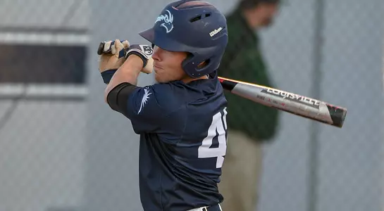 Jay Prather takes a practice swing before approaching the batter's box