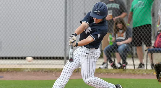 Jay Prather takes a swing at an incoming pitch
