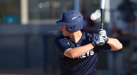 Alex Reynolds waits to hit an incoming pitch