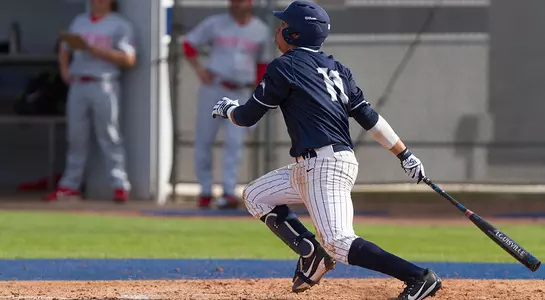 Abraham Sequera releases his bat after hitting a pitch