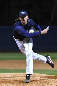 Justin Tworek follows through after a pitch