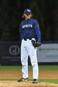 Justin Tworek stands at the mound before throwing his next pitch