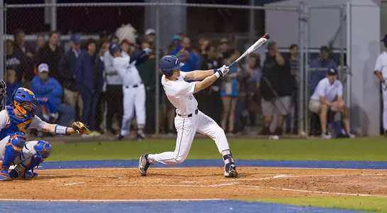 Wes Weeks follows through after swinging at a pitch