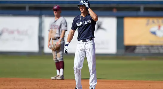 Wes Weeks stands on base, waiting for the next batter to bat