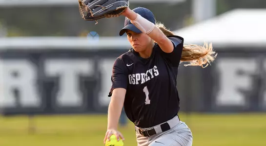 Morgan Blourne winds up to throw the softball.