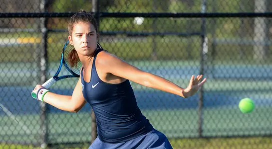 Eva Nyikos returns forehand.