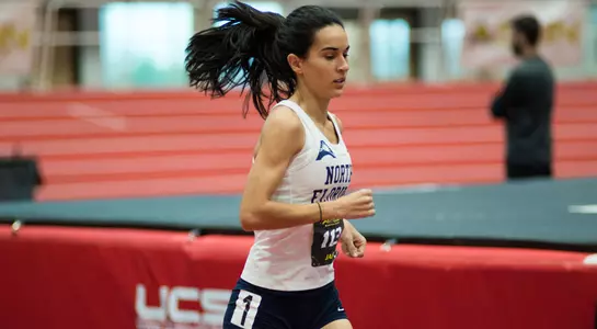 Claudia Jalon runs down the back stretch at ASUN Indoor Championship