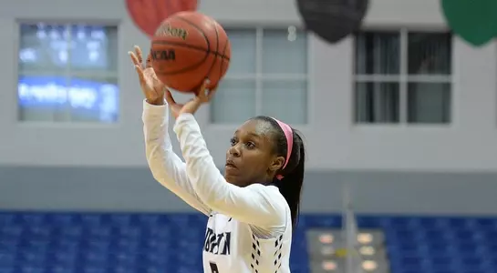 Ty Purifoy takes a shot during the basketball game vs. FGCU.