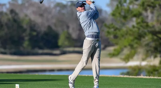 Travis Trace hits a tee shot