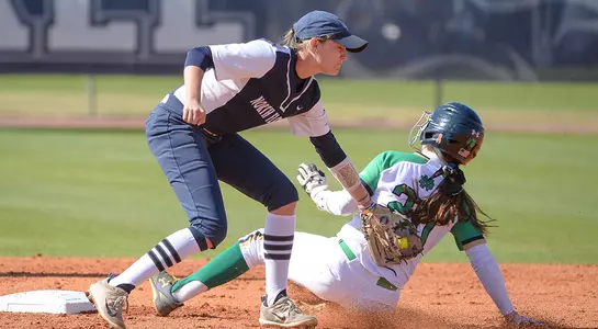 Kayla McGory gets a runner stealing at second base.