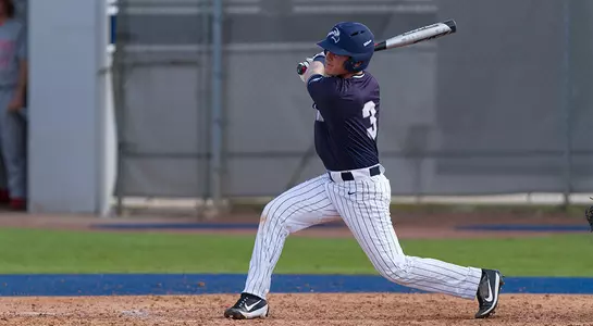 Mac Wilson swinging a baseball bat