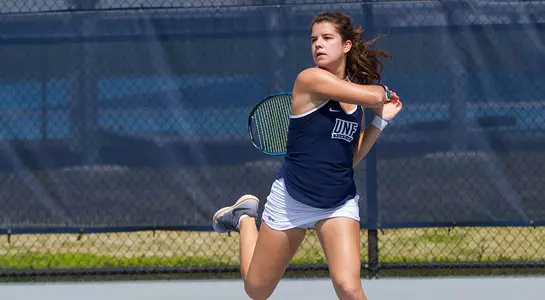 Eva Nyikos follows through on a return.