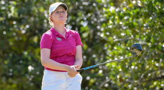 Teresa Conroy watches her tee shot fly down the fairway