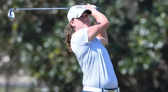 Courtney Cobb hits a drive