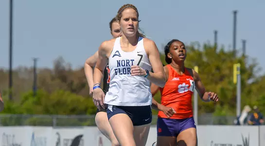 Hallie Grimes races toward the finish line