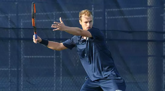 Lasse Muscheites gets set to return the tennis ball.