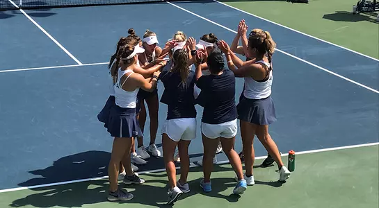 UNF women's tennis huddles before the NCAA Tournament 1st Round.
