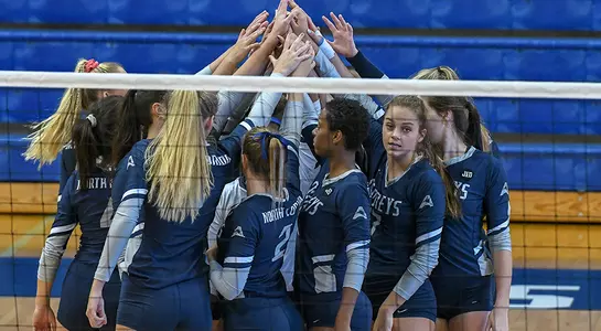 team huddle prior to match against USC Upstate