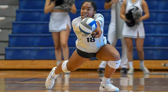 Asante Lopez connects on a dig attempt