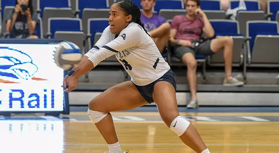Asante Lopez gets in position to make a dig attempt on an oncoming attack.