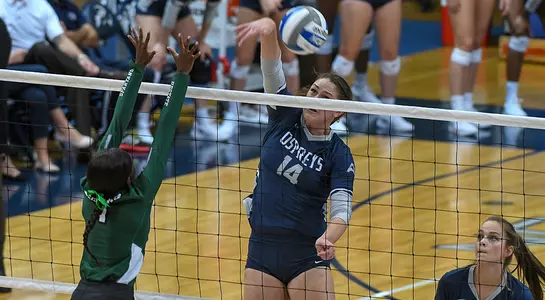 Alana Shoff follows through on an attack attempt as a USC Upstate player comes on in defense.