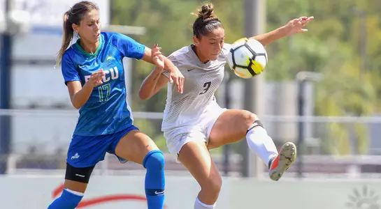 JJ Bryant traps a pass with her foot against FGCU