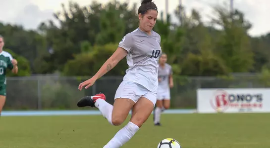 Thais Reiss dribbles the soccer ball down the field