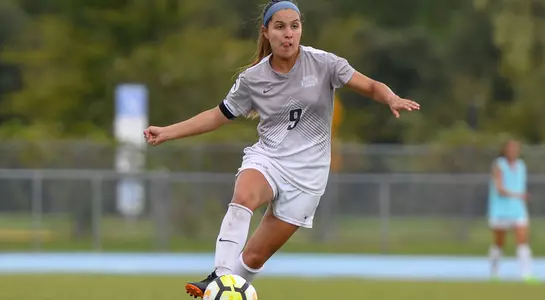 Lisa Cedeno kicks a pass to a teammate