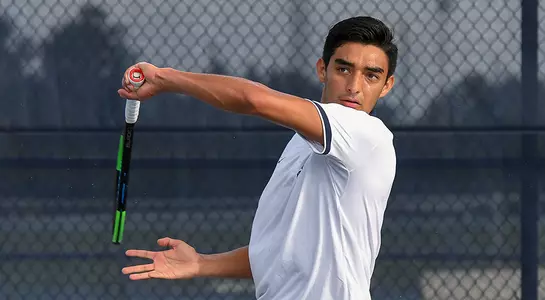 Jorge Nunez hits a left-handed forehand