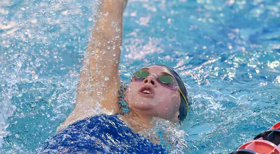 picture of Ryan SHowfety swimming a backstroke event.